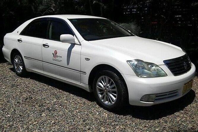 Private Arrival car Transfer: Nadi Airport to Coral Coast Hotels - Nadi Arrivals Meet-and-Greet: shell leis and your name sign
